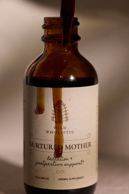 Glass dropper with herbal tincture.